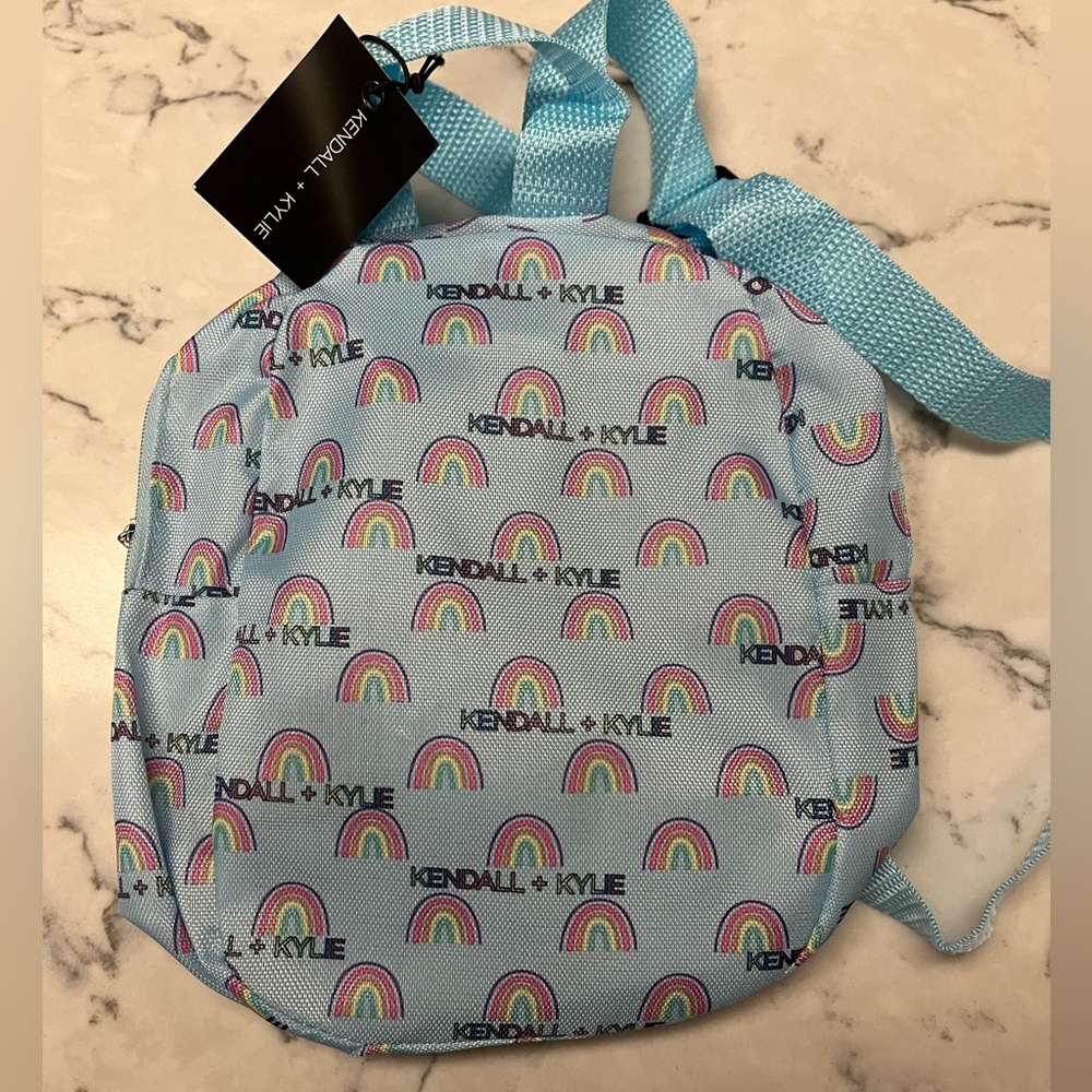 NWT Kendall And Kylie Mini Purse Backpack. Blue with Rainbows :)